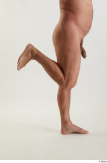 Neeo 1 calf flexing nude side view 0005.jpg